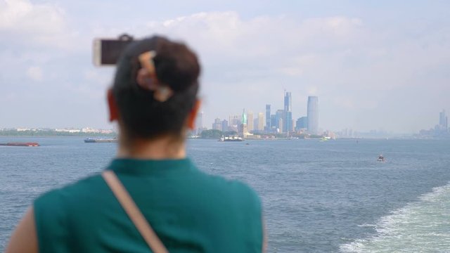 Girl Taking picture of Manhattan New York City in 4K Slow motion 60fps