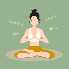 Girl meditates. Girl in yoga pose with a book and a cup of tea sits on the floor.
