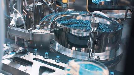 Automatic packaging machine for packaging ampoules with vaccine, injection and medical drugs. coronavirus.