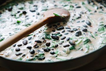 Homemade dish of spinach, black beans and cream. Healthy Nutrition meal. Sofia, Bulgaria.