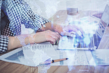 Multi exposure of stock market chart with man working on computer on background. Concept of financial analysis.