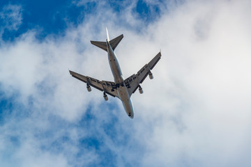 Passenger jet plane in the blue sky