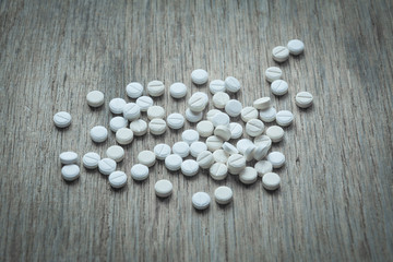 Antibiotic pills on table