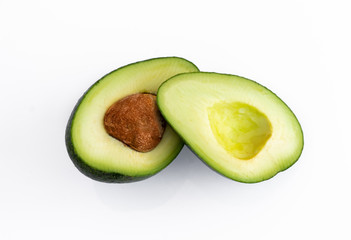  avocado cut isolated on a white background. avocado bone inside