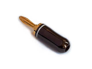 Gold plated red and black high quality banana plugs for cable speakers, isolated on white.