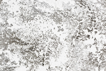 White stucco wall texture. Crack plaster decorative pattern. Abstract shape industrial wall. Uneven stucco layer background. Grunge design backdrop. Scratched paint concrete exterior.