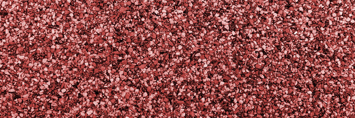 Closeup red bitumen shingle. Rough background made of roofing material