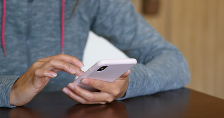 Woman use of smart phone at home