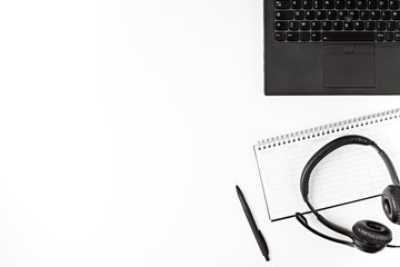 Top view of office desk. Table with laptop and office supplies. Flat lay home office workspace, remote work, distant learning, video conference, calls idea