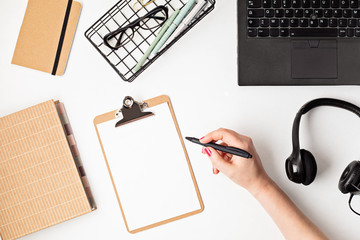 Top view of office desk. Table with laptop and office supplies. Flat lay home office workspace, remote work, distant learning, video conference, calls idea