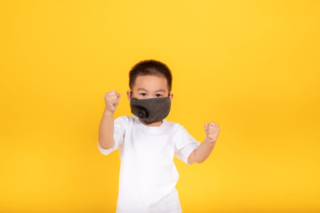 Little asian children boy wearing medical mask protection coronavirus COVID-19 or dust pm2.5...