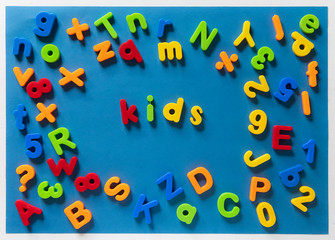 Colorful children letters spelling KIDS