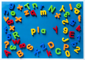 Colorful children letters spelling PLAY