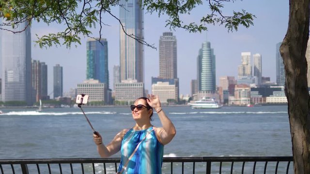 Girl Taking Selfie on Manhattan in New York City in 4K Slow motion 60fps