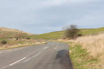 Lake District landscape with hills from road