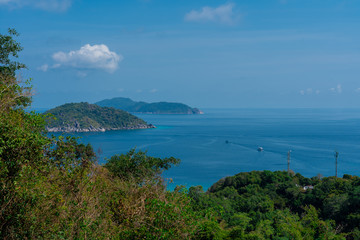 Naklejka premium View from the top of the mountain on beautiful blue lagoon and islands covered with green jungles