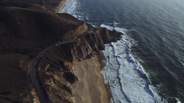 A cinematic aerial shot of Devils Slide on Highway One in Northern California. UHD, 4K.