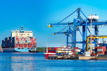 Cargo seaport. Freight ferry leaves for the sea. Concept - unloading of cargo ships. Concept -...