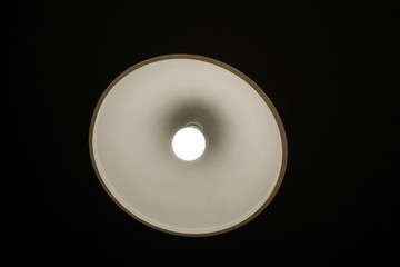 White lamp on black background