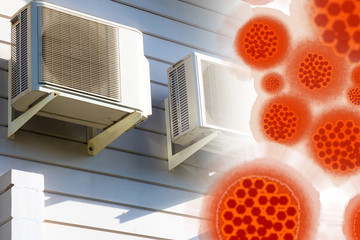 Air conditioners are hanging on the wall. The virus is pictured next to air conditioners. Concept - contaminated oxygen enters the ventilation. Concept - air conditioning with oxygen purification.