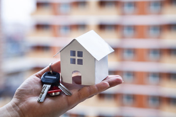 House and keys in hand