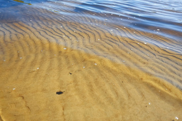 Stains on sand from water