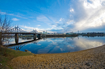 Riverview on the Volga river close to the Old Volga bridge, Old Churches, Tver, Russia, evening light, cloudy sky, distortion perspective, fisheye, spring colors