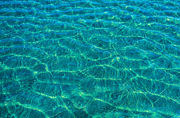 blue water in swimming pool for background