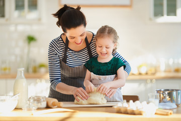 family are preparing bakery together