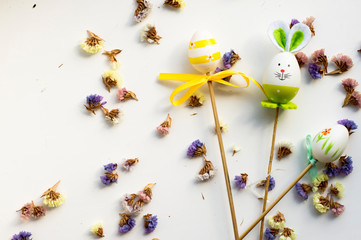  Easter bunny and eggs on a white background with flowers