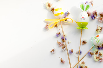 Easter bunny and eggs on a white background with flowers