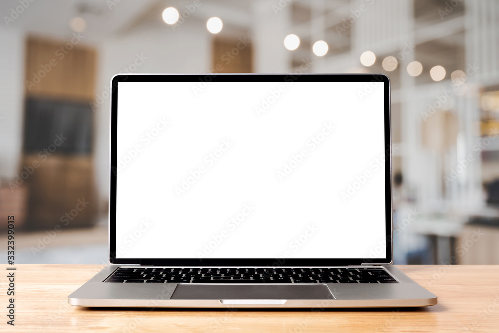 Fototapete laptop blank screen on wood table with coffee cafe background, mockup, template for your text, clipp