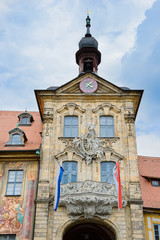 Baroque, ornate carved stone balcony on the exterior facade of an City hall in Bamberg in Germany.  Listed as a World Heritage Site by UNESCO