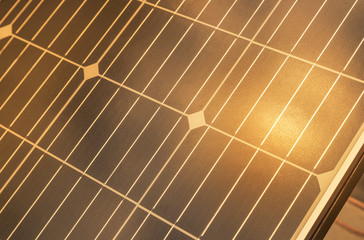 Close up Monocrystalline silicon solar panels or single crystalline silicon solar cells is produce...