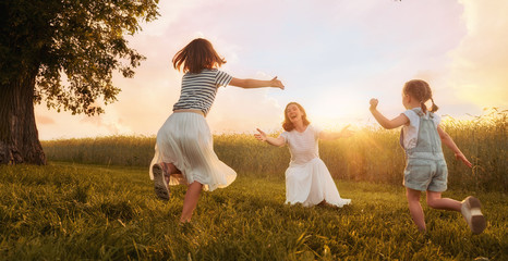 Happy family on summer walk