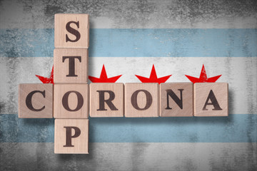 Flag of the city of Chicago with wooden cubes spelling STOP CORONA on it. 2019 - 2020 Novel Coronavirus (2019-nCoV) concept art, for an outbreak occurs in Chicago, Illinois, US.