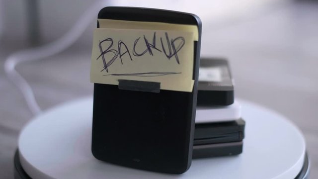 portable hard disk backup cloud drive or physical back-up background