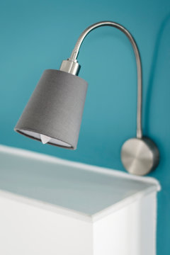 modern design bed lamps detail in contemporary bedroom interior