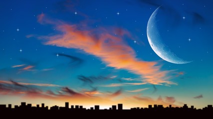 New moon . The sky at night with stars. Sunset above the city 