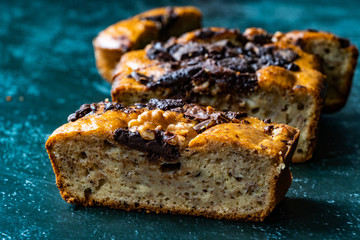 Homemade Organic Healthy Banana Bread Cake Slices with Chocolate Pieces and Walnut.
