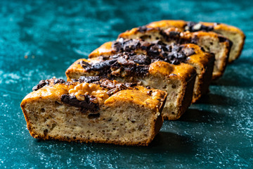 Homemade Organic Healthy Banana Bread Cake Slices with Chocolate Pieces and Walnut.