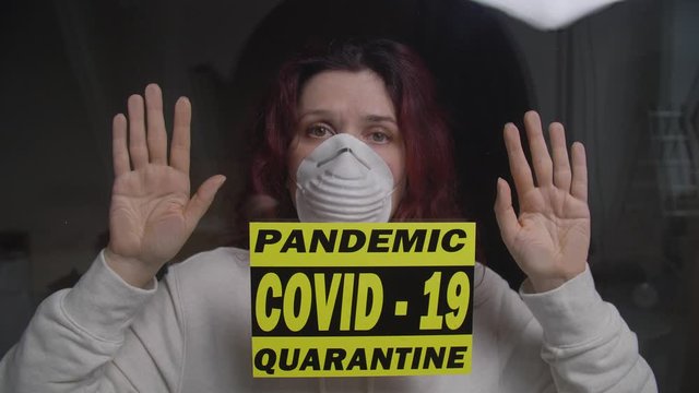 Sad woman in quarantine ward. Coronovirus and isolation concept