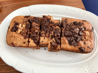 Homemade Organic Healthy Banana Bread Cake Slices with Chocolate Pieces and Walnut.