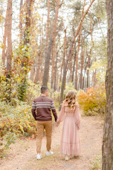 Fototapeta premium couple walking in autumn park
