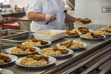 Cook preparing Food in a Professional Kitchen