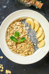 healthy food smoothie bowl, oatmeal, chia seeds and berries (breakfast dish or healthy snack) menu keto or paleo concept. background. top view. copy space for text
