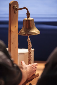 Hand Holding A Boxing Bell