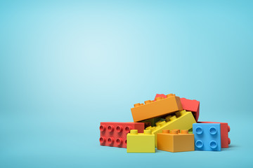 3d close-up rendering of pile of colorful toy blocks on blue background.