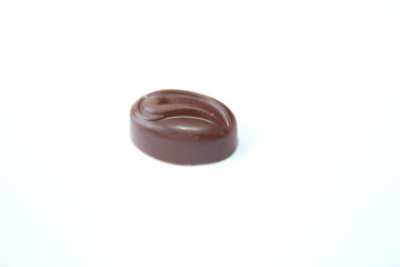 Delicious chocolate candy isolated on white background. Stock photo