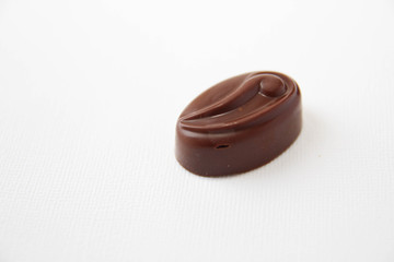 Delicious chocolate candy isolated on white background. Stock photo